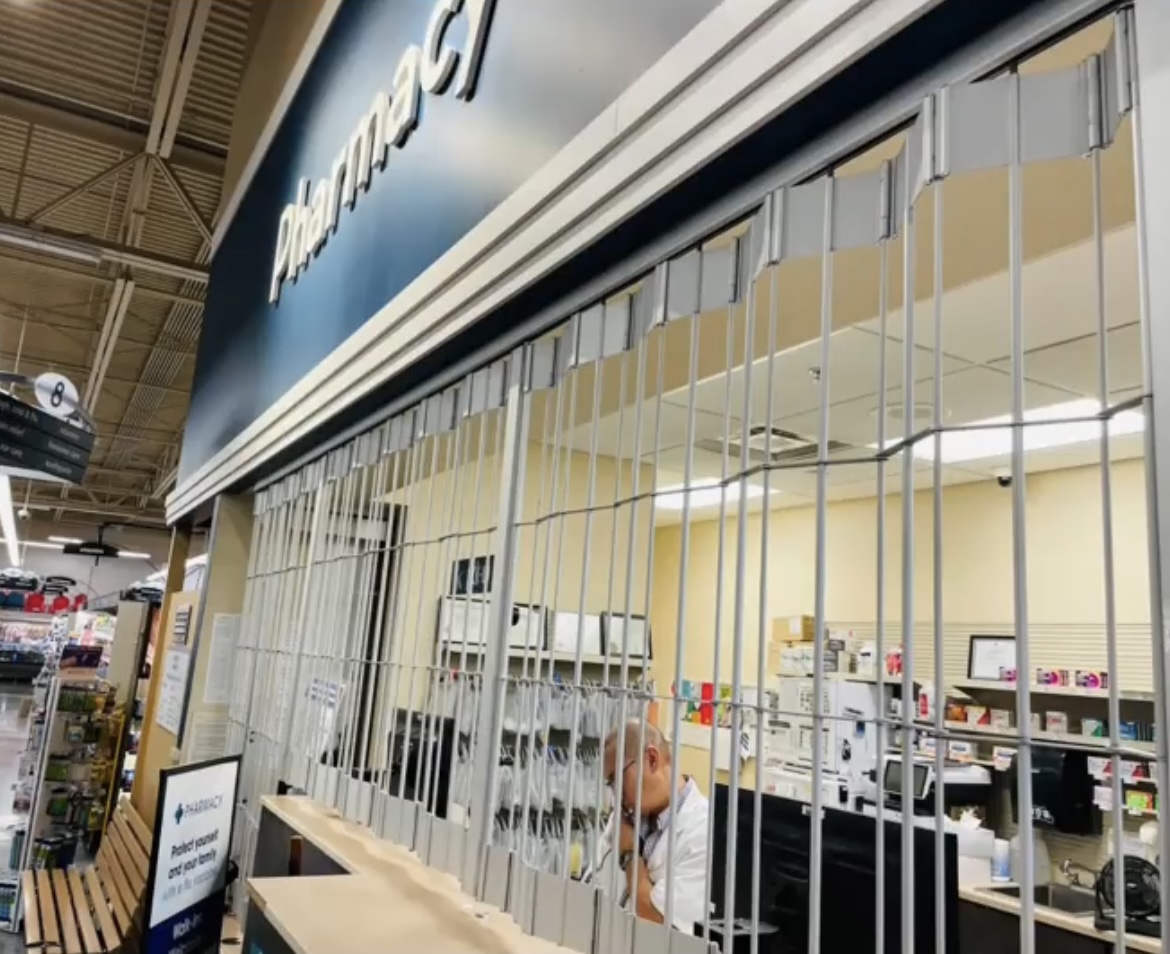 pharmacy security shutters within a grocery store