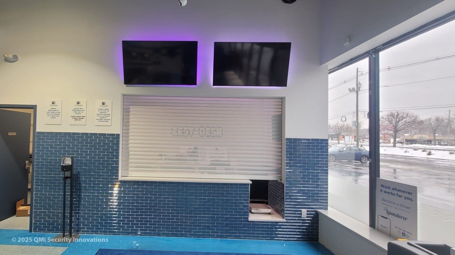 security shutters protecting a countertop for a laundromat